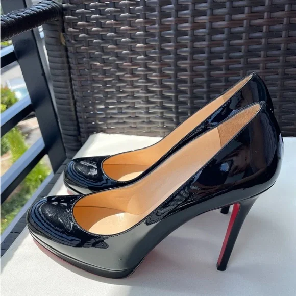 Christian Louboutin in premium leather, these heels feature a classic pump style